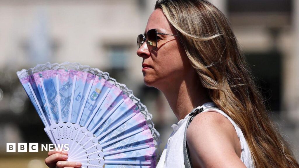 In pictures: Britain swelters in record-breaking June heat