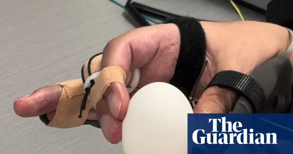 Brain implant helps paralysed man to feed himself and drink from cup | Neuroscience Brain implant helps paralysed man to feed himself and drink from cup | Neuroscience