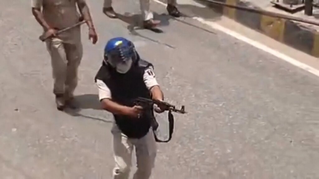 India suspends police officer for firing AK-47 at student protesters | Education