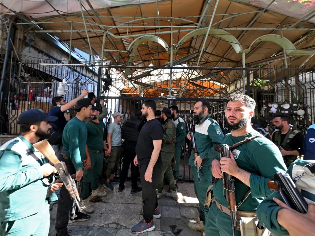 Mourners bury victims of Damascus cafe bombing with six lawyers among dead | Conflict News Mourners bury victims of Damascus cafe bombing with six lawyers among dead | Conflict News
