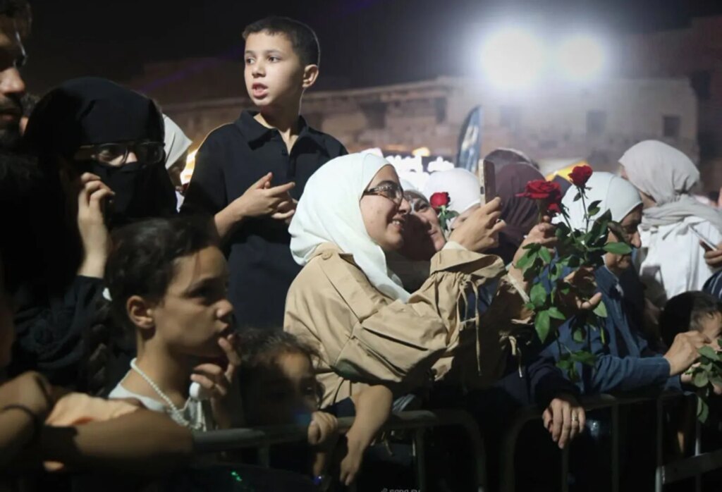 Army drops roses on Syrian crowds in a far cry from war | Syria’s War