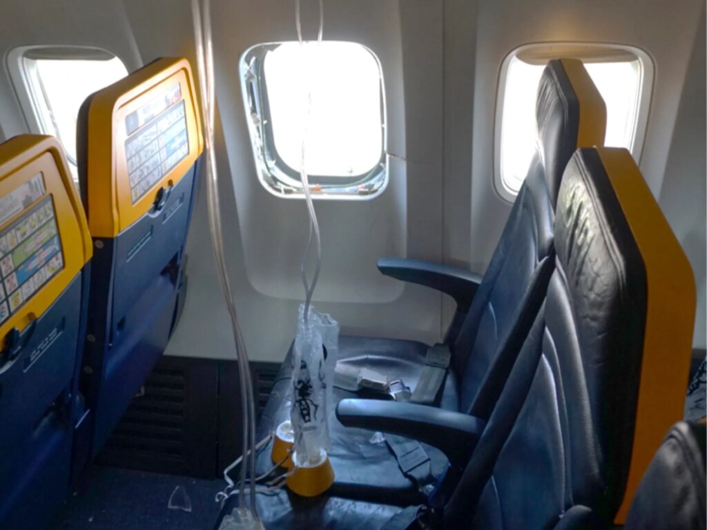 Engine debris shattered Ryanair window, pulling passenger out, NTSB says | News