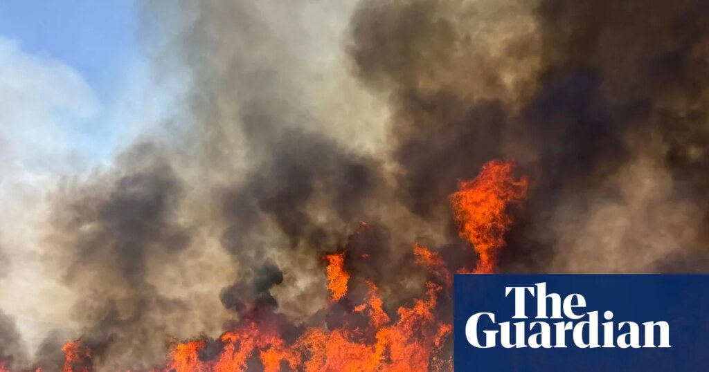 Helicopter fighting Utah wildfire crashes with two people onboard, officials say | US news