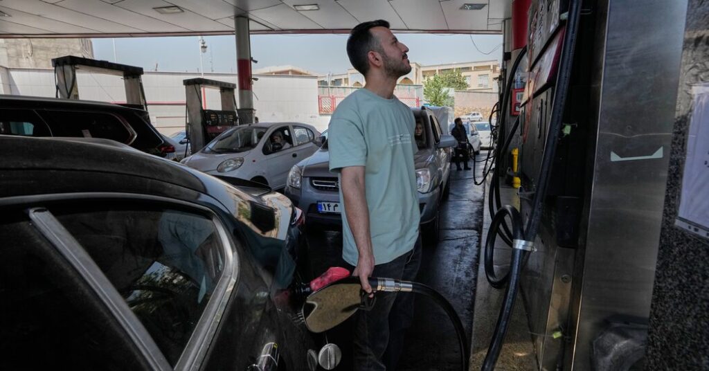Long Lines for Gas in Iran Show War and U.S. Blockade Squeezing Supply