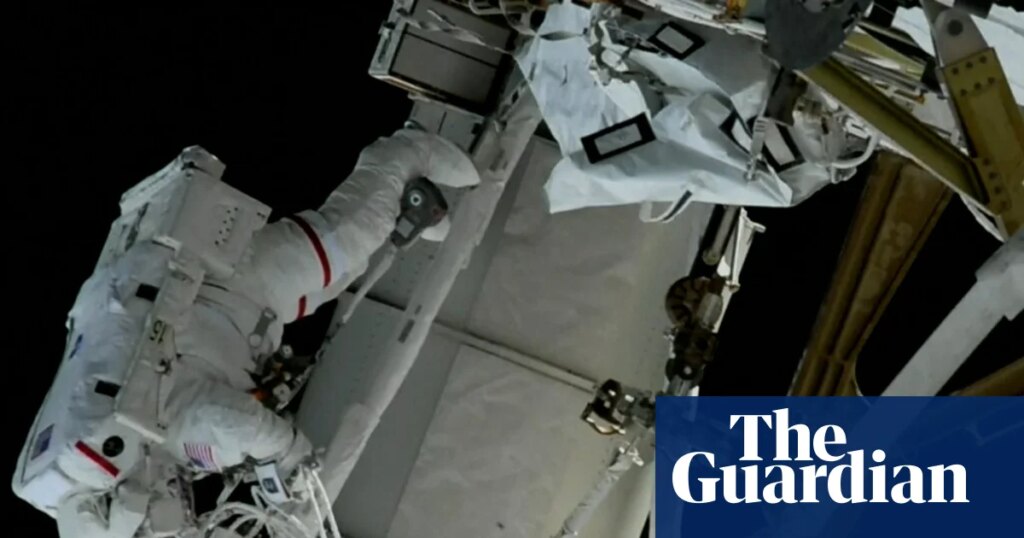 Nasa astronauts conduct spacewalk outside International Space Station – video