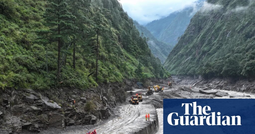 Overflowing lake halts rescue efforts as Nepal-Tibet flood death toll hits 474 | Nepal-Tibet flood disaster
