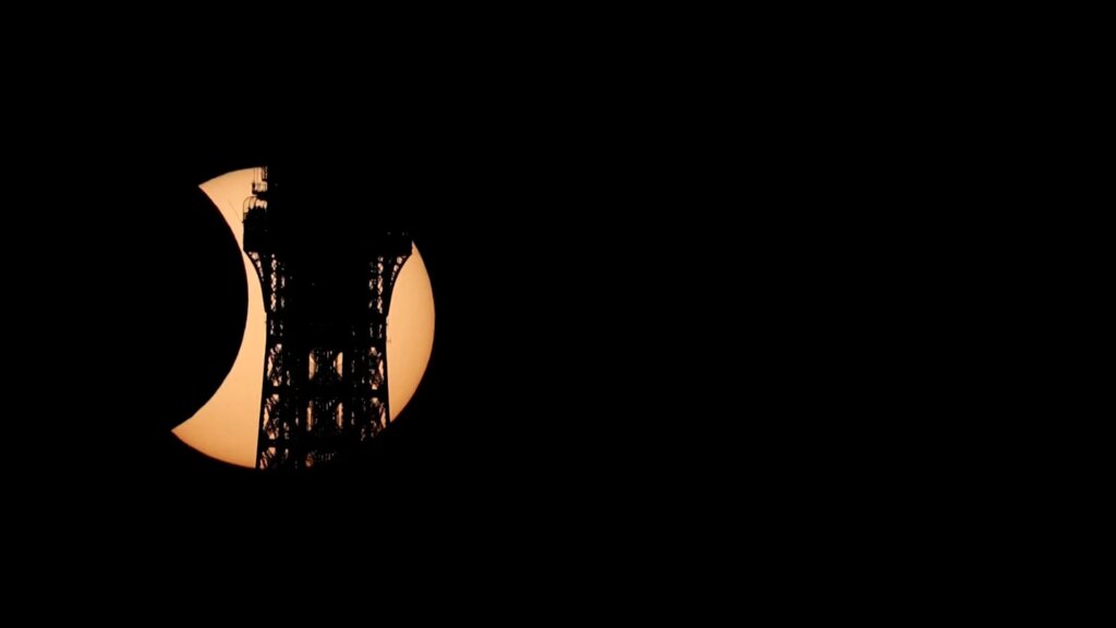 Solar eclipse carves Eiffel Tower’s silhouette in Paris sky | Science and Technology