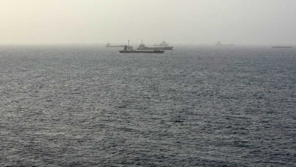 Tankers near Oman come under fire as Iran threatens shipping routes