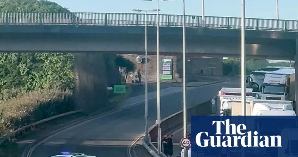 Black-clad protesters in balaclavas block road at port of Dover in Kent | Kent