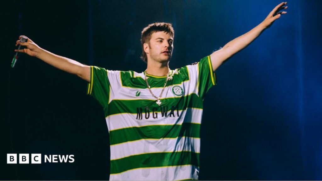 Fontaines D.C. singer in Cwmbran Celtic FC shirt at Reading Festival