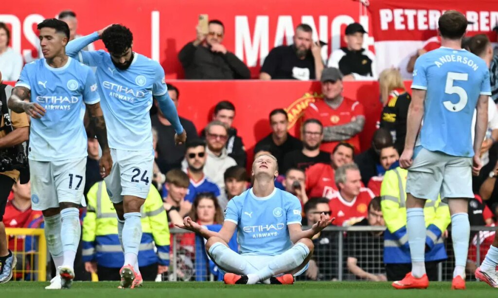 Haaland fires 10-man Man City to famous win at Man Utd Haaland fires 10-man Man City to famous win at Man Utd
