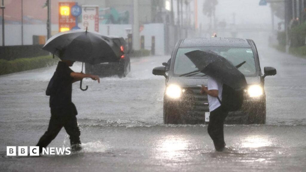 Millions urged to evacuate as Typhoon Dujuan hits Japan Millions urged to evacuate as Typhoon Dujuan hits Japan